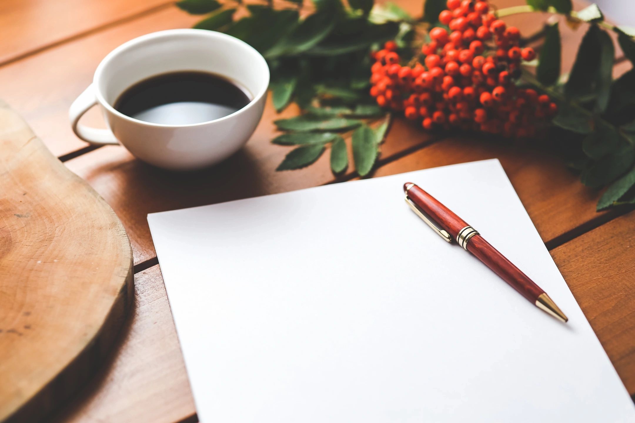 coffee and blank paper with pen